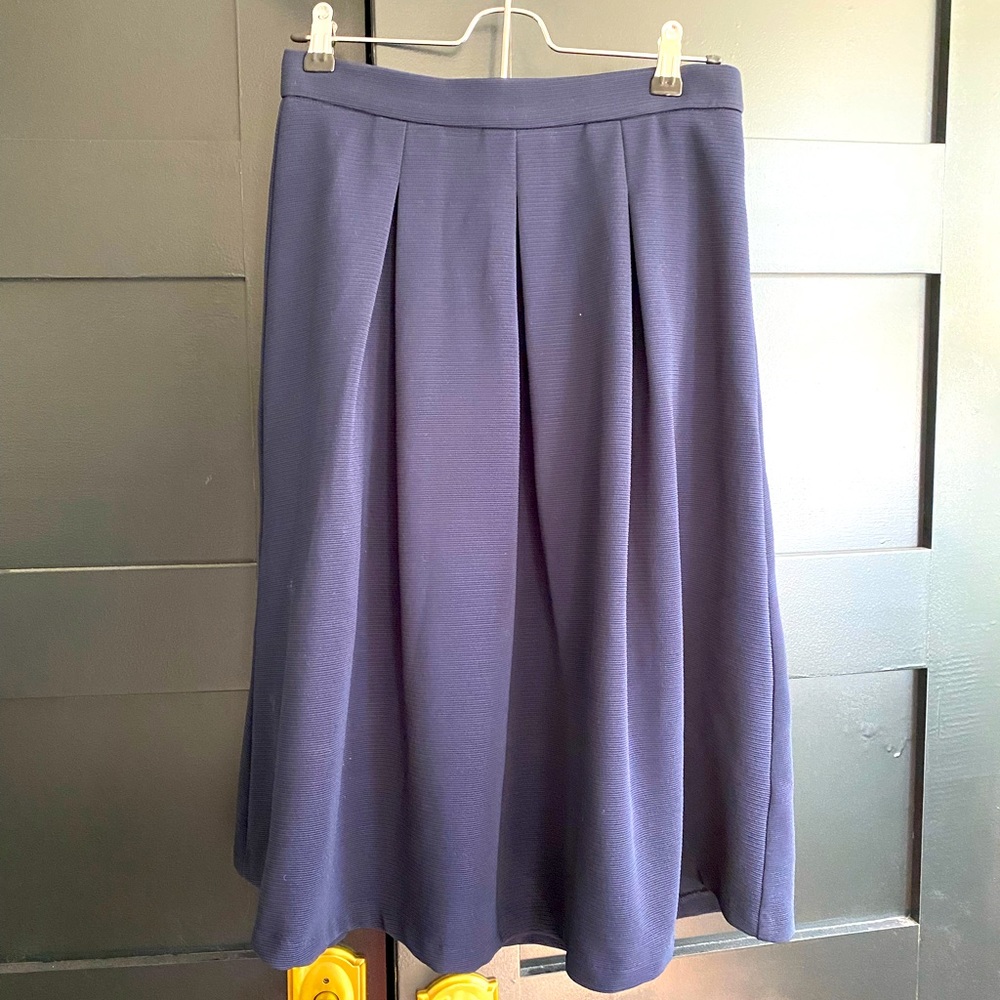 Perfectly pleated navy blue work skirt